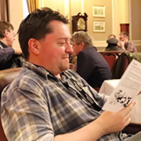 Phil paying attention at a con