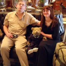 Serena and John with a teddy bear friend