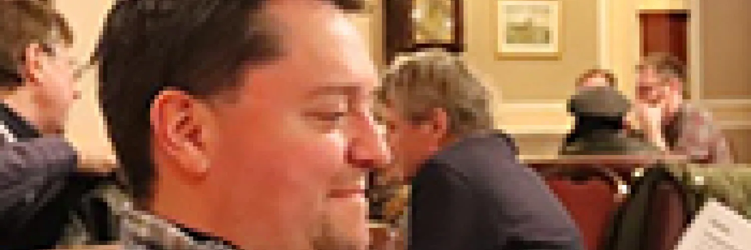 Phil paying attention at a con