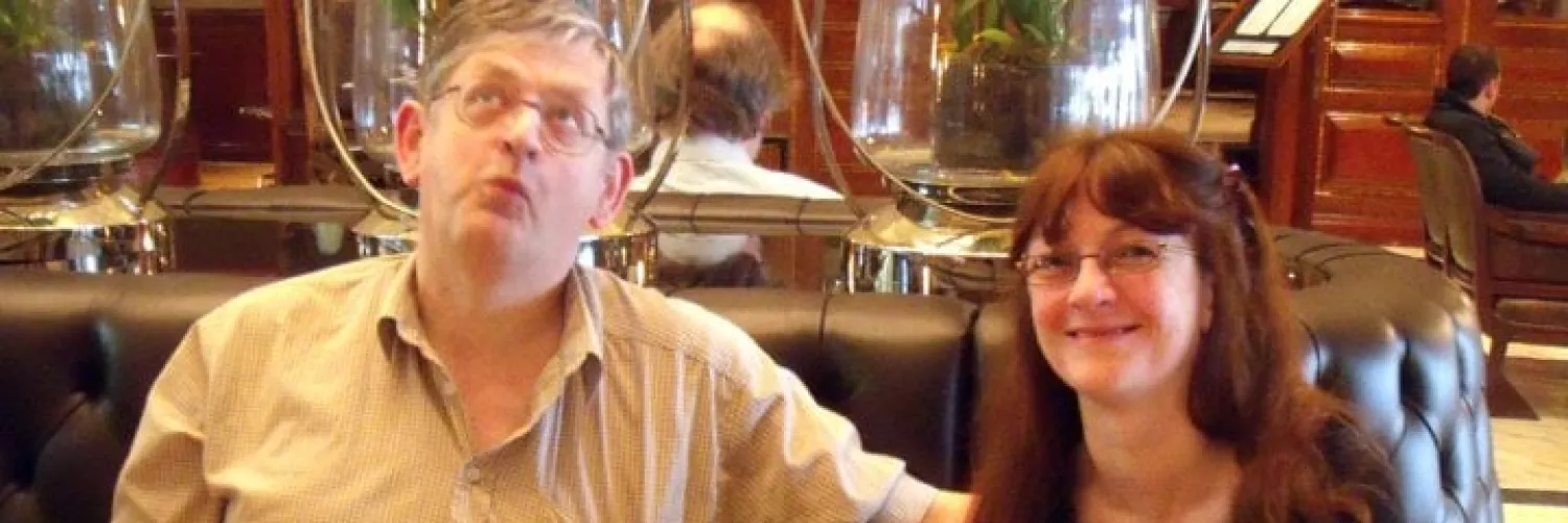 Serena and John with a teddy bear friend